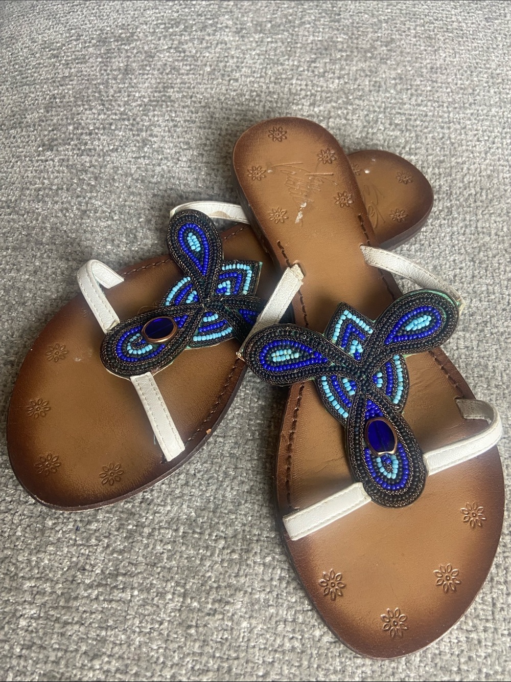 Very Volatile Brown Sandals with White Straps and Blue Beaded Accent